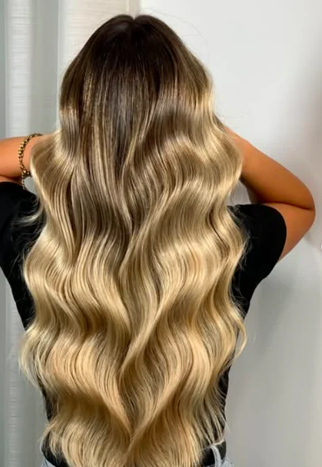 Balayage loiro em cabelo comprido